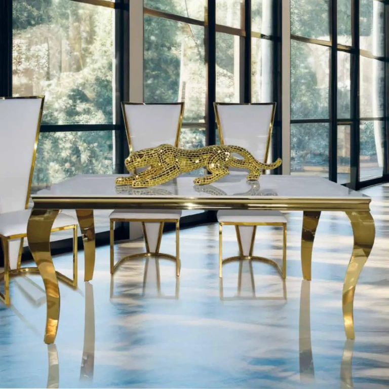 mesa de comedor acero oro Gaudí cristal porcelanico